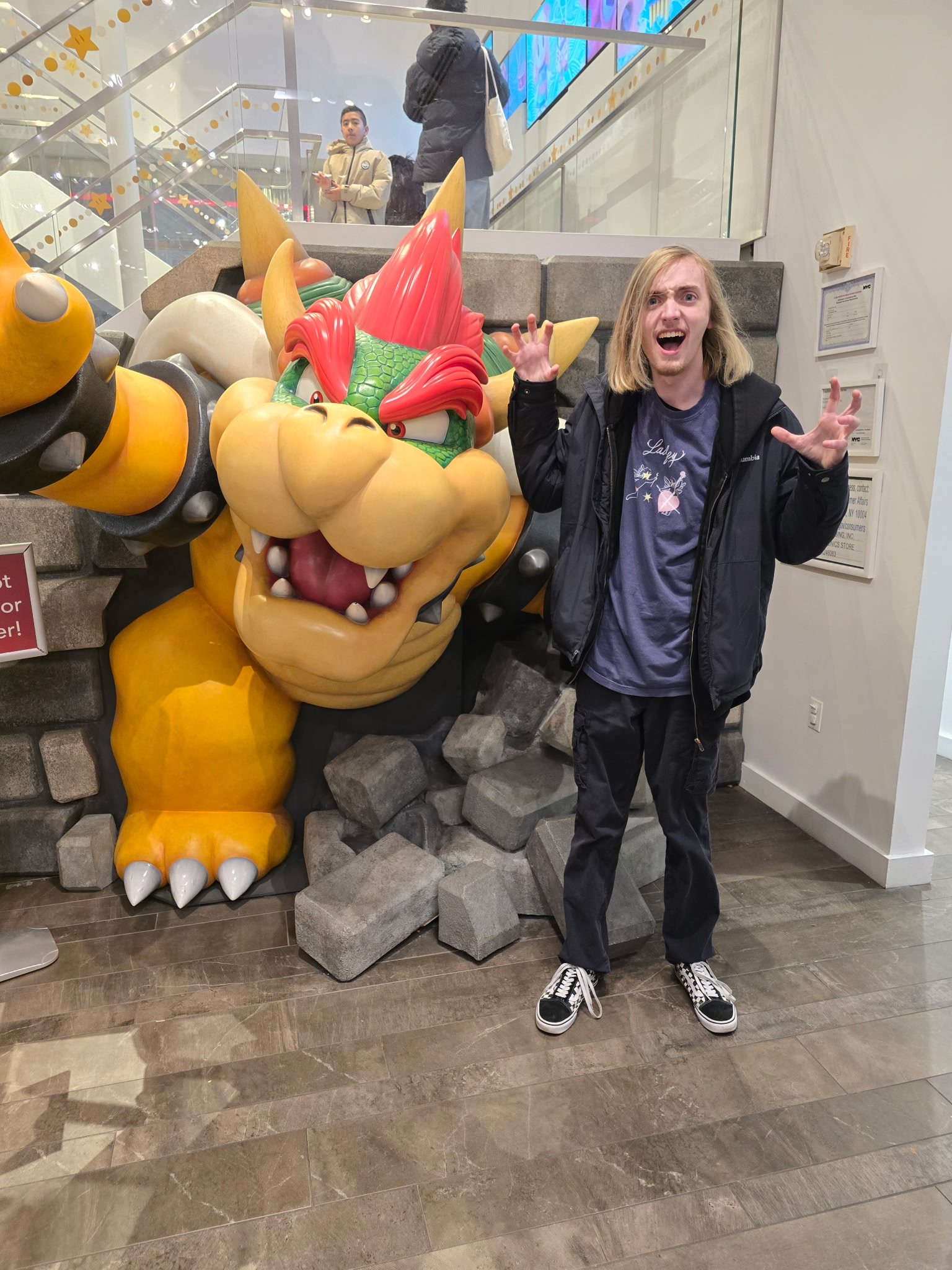 Myself with Bowser at the Nintendo store in NYC